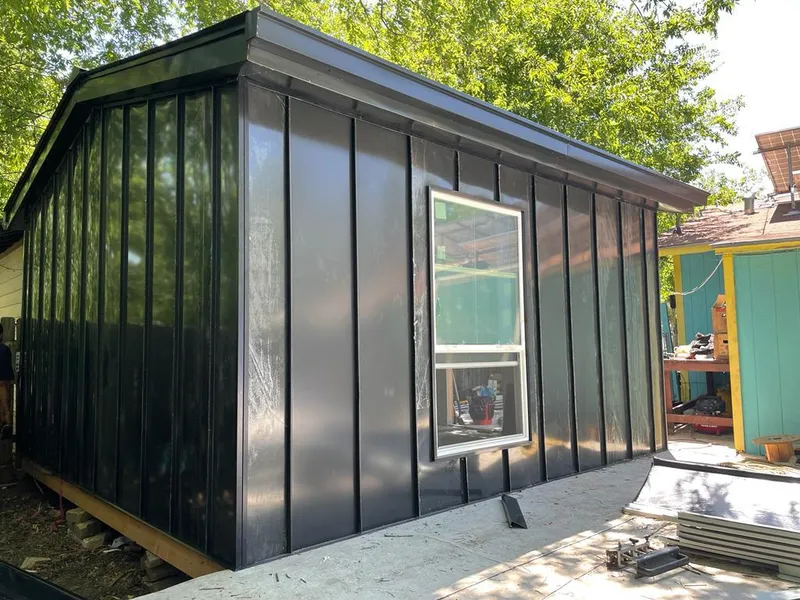 Black standing seam metal wall panels for Roof Inspection in Park City