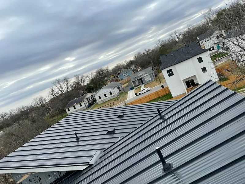 Standing seam metal roof panels with vents for Skylight Repair in Park City